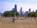 USA, Illinois, CHICAGO, skyline, and people playing volleyball, North Avenue Beach, CHI807JPL