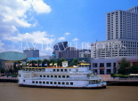 USA, Louisiana, NEW ORLEANS, Downtown skyline and Cajun Queen boat on Mississippi River, LOU113JPL