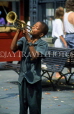 USA, Louisiana, NEW ORLEANS, street musician (boy) playing trumpet, LOU208JPL