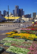 USA, Texas, DALLAS, Farmers Market, flower stalls and city view, DAL201JPL