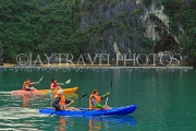 VIETNAM, Halong Bay, tourists kayaking, VT1960JPL