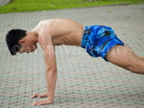 VIETNAM, Hanoi, kickboxer doing pushups, VT535JPL