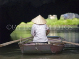 VIETNAM, Ninh Binh, woman rowing boat on Tam Coc River, VT527JPL