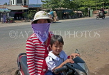 VIETNAM, Saigon (Ho Chi Minh City), mother and child on motorcycle, VT713JPL
