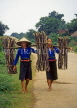 VIETNAM, Son La Province, rural women carrying wood bundles, VT282JPL