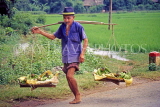 VIETNAM, Son La Province, vendor with bananas in baskets, VT283JPL