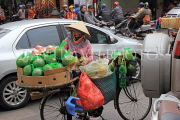 Vietnam, HANOI, Old Quarter, Street Vendor, with fruit loaded on bicycle, VT1625JPL