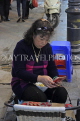 Vietnam, HANOI, Old Quarter, woman checking her phone, VT1457JPL