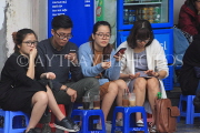 Vietnam, HANOI, Old Quarter, young people socialising at coffee shop, VT1333JPL