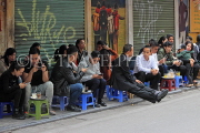 Vietnam, HANOI, Old Quarter, young people socialising by a roadside cafe, VT1472JPL