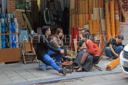 Vietnam, HANOI, Old Quarter, young people socialising by a roadside cafe, VT1473JPL