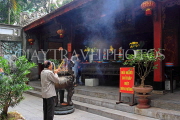 Vietnam, HANOI, Quan Thanh Temple (Tran Vu), worshipper by the main shrine, VT1651JPL
