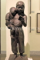 Vietnam, HANOI, Vietnam Fine Arts Museum, exhibits, readin holding baby, bronze, VT799JPL