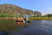 Vietnam, Ninh Binh, TAM COC, Ngo Dong River, limestone karst scenery, and tour boat, VT2073JPL