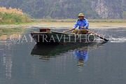 Vietnam, Ninh Binh, TRANG AN, man rowing  small boat, VT2278JPL