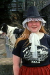 WALES, North Wales, Anglesey, girl intraditional costume, posing, WAL788JPL