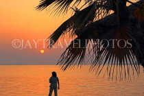 BAHRAIN, Al Jasra, seaside, and woman watching the sunset, BHR1466JPL