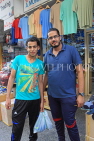 BAHRAIN, Manama Souk (Souq), two Bahraini men posing for photo, BHR690JPL