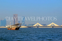 BAHRAIN, Muharraq, Shaikh Isa Causeway Bridge, and dhow at sea, BHR2525JPL