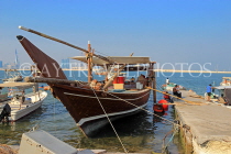 BAHRAIN, Muharraq, coastal fishing village area, and Dhow moored by a pier, BHR2473JPL