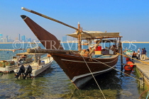 BAHRAIN, Muharraq, coastal fishing village area, and Dhow moored by a pier, BHR2474JPL
