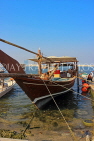 BAHRAIN, Muharraq, coastal fishing village area, and Dhow moored by a pier, BHR2475JPL