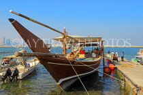 BAHRAIN, Muharraq, coastal fishing village area, and Dhow moored by a pier, BHR2476JPL