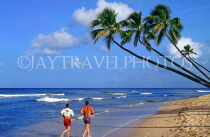 BARBADOS, West Coast, joggers and leaning coconut trees, BAR151JPL