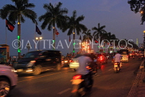 CAMBODIA, Phnom Penh, Sisowath Quay area, street scene at night, CAM1994JPL