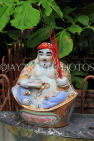 CAMBODIA, Phnom Penh, Wat Phnom, small shrine figure, CAM1951JPL