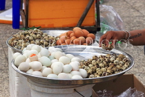 CAMBODIA, Phnom Penh, street food, stall selling eggs, CAM2093JPL