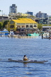 CANADA, British Columbia, VANCOUVER, man kayaking in False Creek, and Granville Island, CAN902JPL