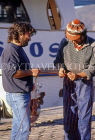 Greek Islands, CRETE, Agios Nikolaos, fishermen sorting out nets, GIS1198JPL