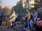 HOLLAND, Amsterdam, cyclists on bridge, HOL112JPL