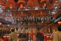 HONG KONG, Hong Kong Island, Man Mo Temple, men hanging incense coils, HK1903JPL