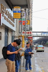 HONG KONG, Hong Kong Island, people waiting at bus stop, HK997JPL