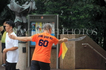 HONG KONG, Kowloon, Kowloon Park, man practicing Tai Chi, HK1689JPL