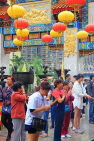 HONG KONG, Kowloon, Wong Tai Sin Temple, worshippers with incense sticks, HK1176JPL