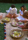 Hawaiian Islands, OAHU, Lei making with fresh Spary Orchids, HAW614JPL