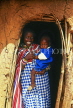 KENYA, Masai Mara mother and baby, in doorway, KEN10JPL