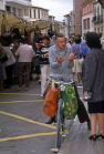 MALLORCA, Inca, man on bicycle, talking to woman, MAL1127JPL