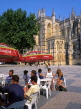 PORTUGAL, Batalha, outdoor cafe scene and Batalha Monastery, POR519JPL