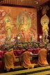 SINGAPORE, Chinatown, The Buddha Tooth Relic Temple, main hall and monks, SIN594JPL