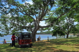 SRI LANKA, Anuradhapura, Basawakkulama tank and parked three wheeler taxi, SLK5558JPL