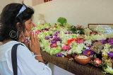 SRI LANKA, Anuradhapura, Jaya Sri Maha Bodhi (sacred Bo tree), worshipper at shrine, SLK5503JPL