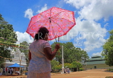 SRI LANKA, Anuradhapura, pilgrim visiting ancient city, SLK5525JPL
