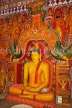 SRI LANKA, Kandy area, Asgiriya Monastery, seated Buddha statue in the image house, SLK3210JPL