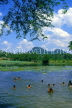 SRI LANKA, Kurunegala, rural scene, children playing in small lake, SLK226JPL