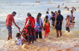 SRI LANKA, Negombo, Negombo Beach Park, Sunday evening crowds enjoying the sea, SLK6260JPL