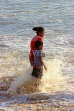 SRI LANKA, Negombo, evening by the seaside, people enjoying paddling, SLK5946JPL